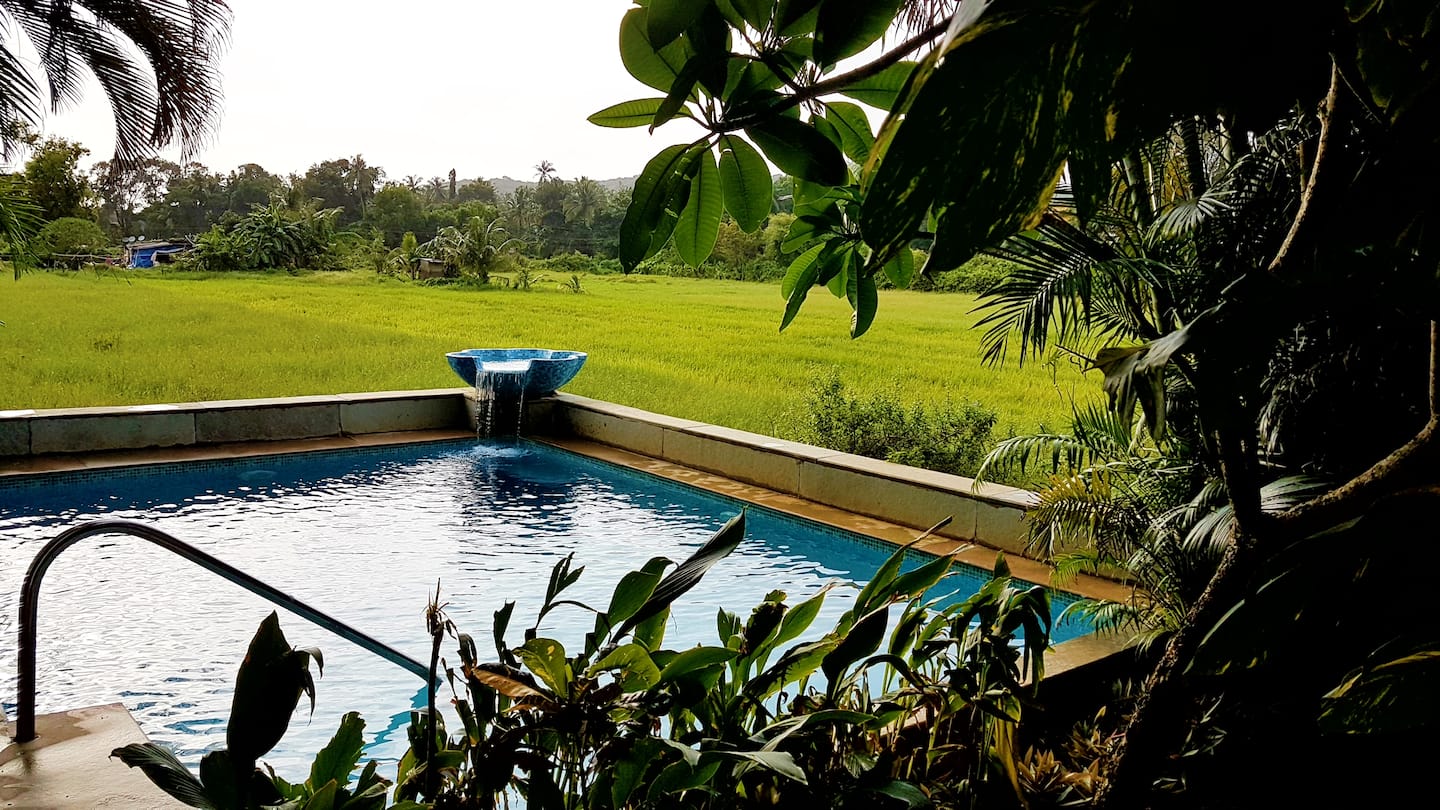 Peacocks' Crown, villa with private pool overlooking paddy fields near Baga